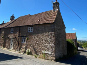 The Nook- A Rustic Cottage in a Beautiful Village.